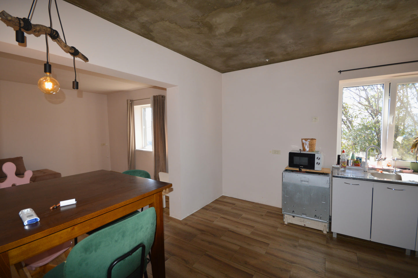 property house and plot of land for sale in podi with sea view